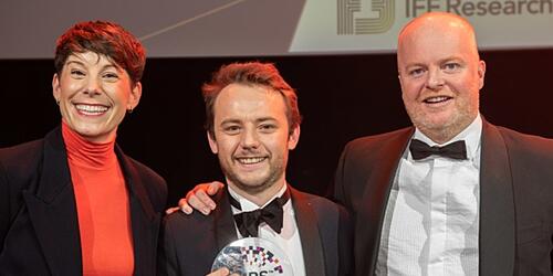 Chris Curtis collecting his award